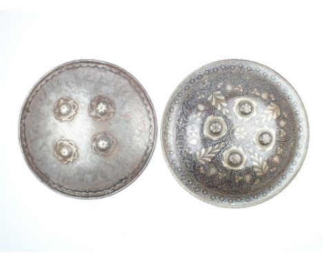 Two Various Decorated Steel Indian Shields, the first 37.5cm in diameter and decorated with elephants in silver damascene, th