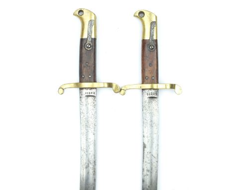 A Brace of Norwegian Model 1860 Remington Bayonets, each with 57cm recurved blade, stamped with a serial no. and the crown ov