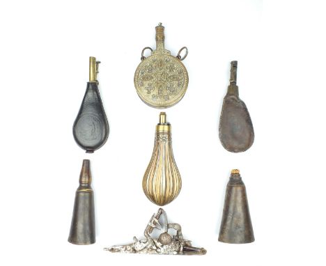 An Embossed Copper Powder Flask, decorated with a reeded design, together with two horn powder flasks, two leather shot flask