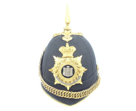 A Victorian Officer's Blue Cloth Home Service Helmet to the Devonshire Regiment, the blue cloth covered skull with gilt brass