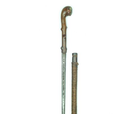 A 19th Century Swordstick, 68.5cm flattened diamond section blade with short central fuller pierced with geometric designs in