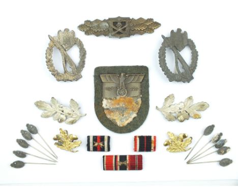 An Interesting Collection of Third Reich Insignia and Badges, comprising Krim Shield with backing, four Infantry Assault Badg