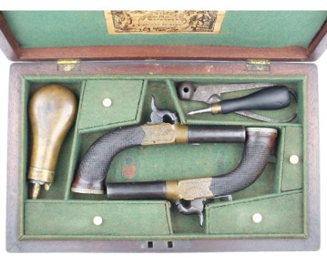 A Cased Pair of Brass Framed Percussion Boxlock Pocket Pistols by Parker, 2.25inch turn-off barrels with linear engraving at 