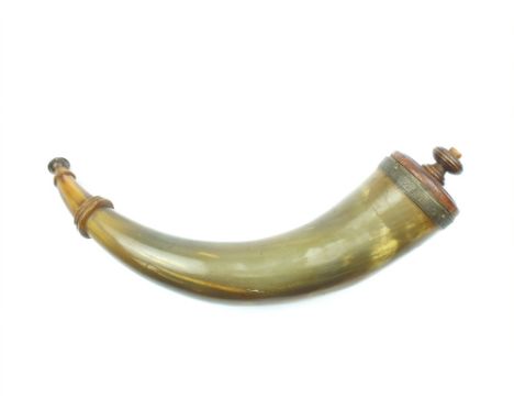 A Polished Horn Powder Flask, the natural form body with later stopper, the base with brass band engraved GB 1784.
