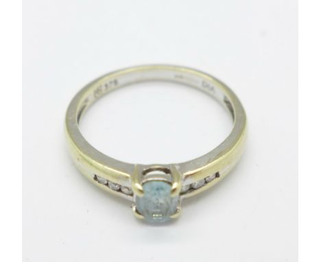 A 9ct gold, blue stone and diamond ring, 2g, K