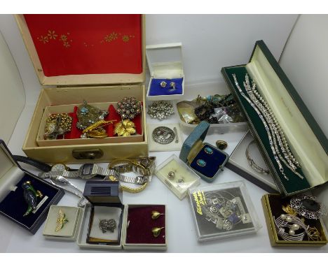 Costume jewellery including a brass and agate ring, a/f, a silver and stone set bangle, brooches and wristwatches