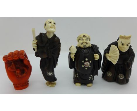 Three carved wooden and bone netsukes and one other netsuke