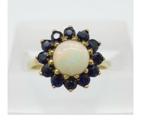 A 9ct gold, sapphire and opal ring, 2.4g, O