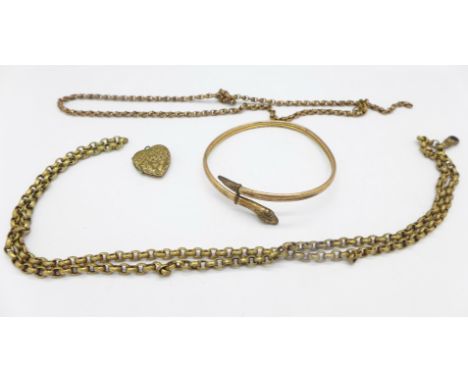 A snake bangle, a photograph locket and two chains