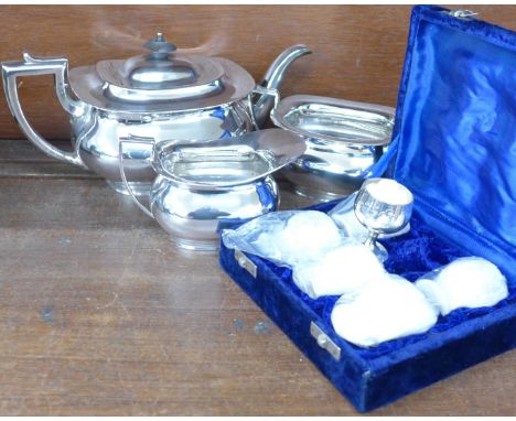 A three piece plated tea service and a cased set of EPNS goblets