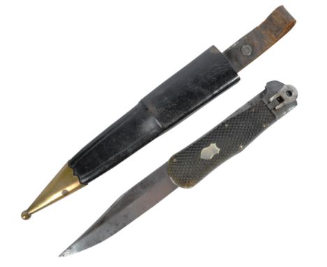 An unusual WWII Second World War period possibly German made Special Operations type folding combat knife. Checked grips, wit