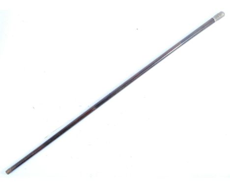 A 20th Century British Army ( Hampshire Regiment ) officers swagger stick. The wooden cane / stick having a white metal cap d