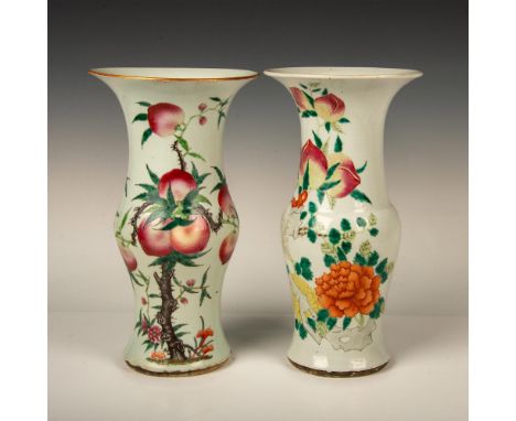 Two beautiful white ground vases in beautiful enamel colors. One vase features a peach tree, and the other vase depicts a flo