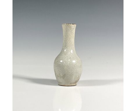 A small light gray vase with dark gray craquelure. Issued: 19 th centuryDimensions: 2.5"W x 5"HCountry of Origin: ChinaCondit