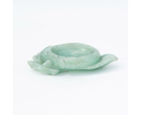 Elegantly carved green jadeite bowl with a lotus flower and leaves. Perfect for Chinese brush painting. Dimensions: 3.5"L x 2