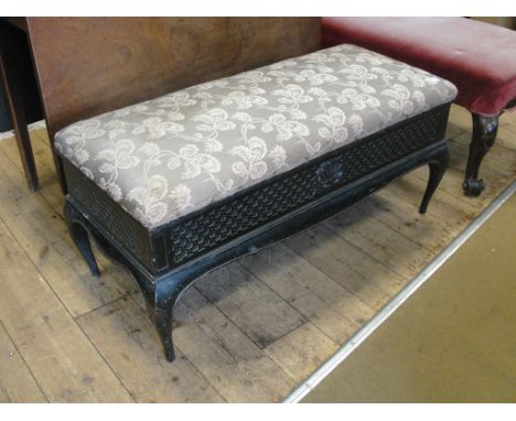 An Edwardian double piano stool
