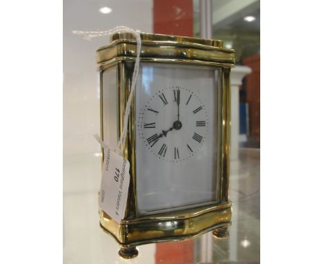 A 19th century carriage clock with ornate case