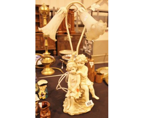Large double shaded ceramic figural table lamp