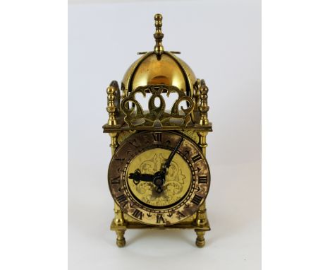 Brass mechanical lantern clock by Smiths, working at lotting up