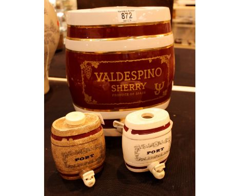 Large ceramic Valdespino sherry cask and two wade examples