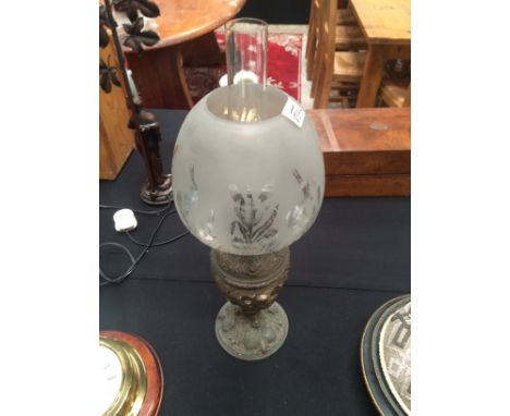 Metal bound antique oil lamp with etched glass shade