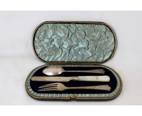 Cased Victorian silver knife, fork and spoon set. Assay Birmingham 1888/9, maker Hilliard & Thomason
