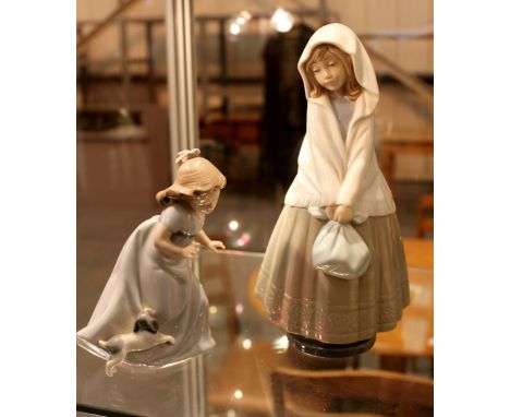 Two NAO figurines of young girls one A/F