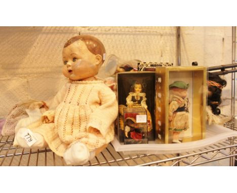 Vintage ceramic headed doll with quantity of original clothing and tray of collectable souvenier dolls, mostly boxed