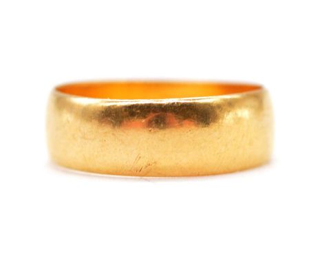 A 22 carat yellow gold wedding band, 6mm wide plain polished band ring size L, Birmingham 1918, 4g.