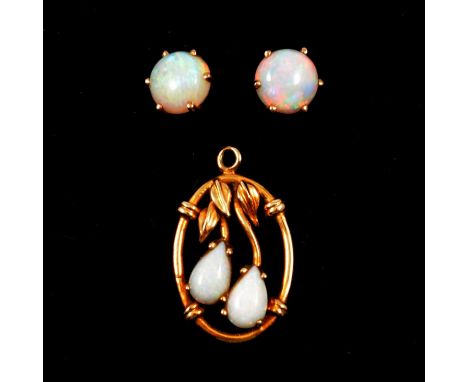 An opal pendant and pair of opal earstuds, an opal floral pendant, the two pear shape cabochon cut opals claw set in a floral