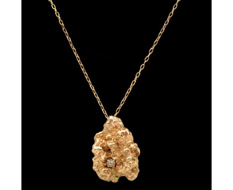 A 9 carat yellow gold molten finish pendant with a small brilliant cut diamond illusion set to front, pendant 40x28mm, hallma