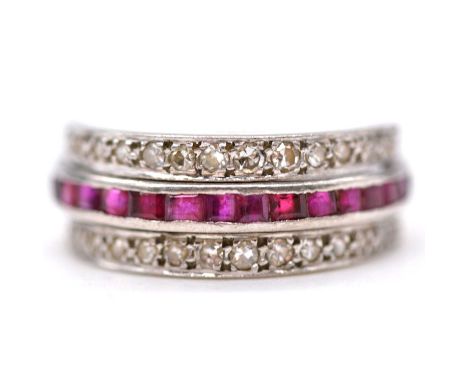 A sapphire, ruby, and diamond night and day ring, a full eternity ring with a white metal band set with square cut sapphires 