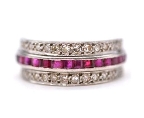 A sapphire, ruby, and diamond night and day ring, a full eternity ring with a white metal band set with square cut sapphires 