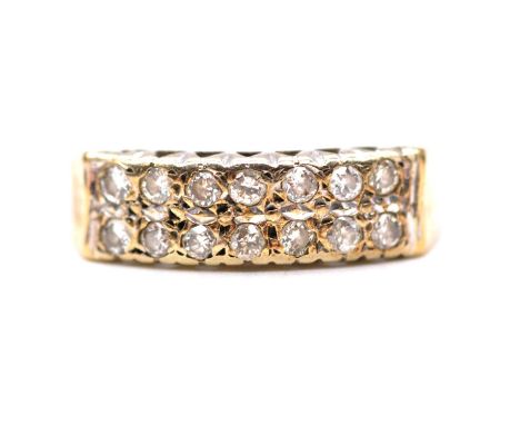 A two row diamond ring, fourteen brilliant cut stones arranged in two horizontal rows of seven diamonds each iin a 9 carat ye
