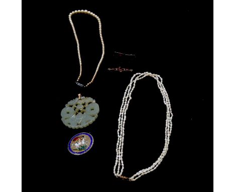 A jade pendant, 55cm carved and pierced disc; triple row freshwater pearl necklace with 14k fastener, 45cm; a simulated pearl