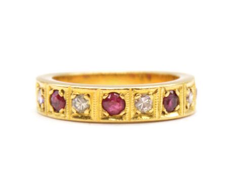 A ruby and diamond half eternity ring, five rubies and four brilliant cut diamonds individually pip claw set in square settin