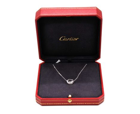 Cartier - an 18 carat white gold and diamond double ring Love pendant and chain, one of the 8mm rings in the style of the Lov