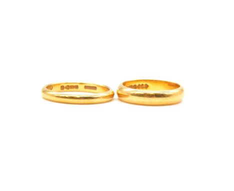 Two 22 carat yellow gold wedding bands, a 2.8mm wide plain polished band ring size N, Chester 1939, a 4.2mm wide plain polish