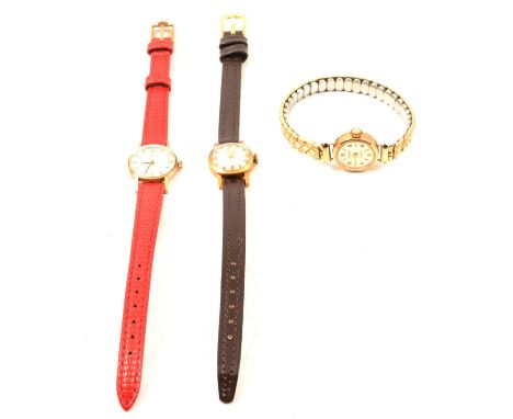 Three vintage ladies' 9 carat yellow gold wristwatches, Omega - a lady's 9 carat yellow gold wristwatch, 17mm circular silver