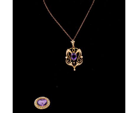 An Edwardian amethyst and pearl pendant, the 30mm yellow metal frame marked 9c set with a 9x7mm oval amethyst to the centre s