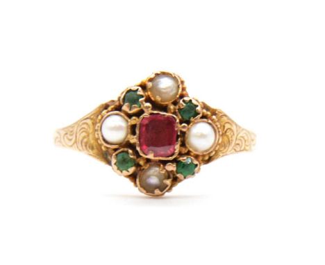 A Victorian gemstone ring, a faceted pink stone to centre surrounded by four small emeralds and four small pearls in an all y