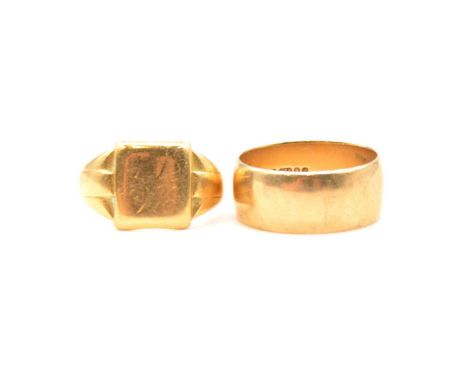 A 9 carat yellow gold wedding band, 9mm wide plain polished half D shape ring size S centre, 7g; an 18 carat yellow gold sign