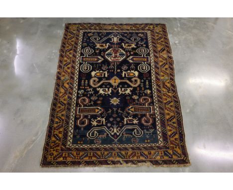 A PERSIAN HAMADAN FLATWEAVE RUG 160 x 114cm
Featuring a deep indigo field with stylised hooked medallions and geometric anima