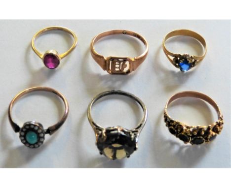 A Victorian gold and garnet ring, two settings vacant, a Victorian pearl and turquoise ring, three gold rings and a silver ri