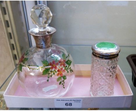 A large round perfume bottle with pink painted flowers, silver collar and facetted stopper, together with a small round cut g