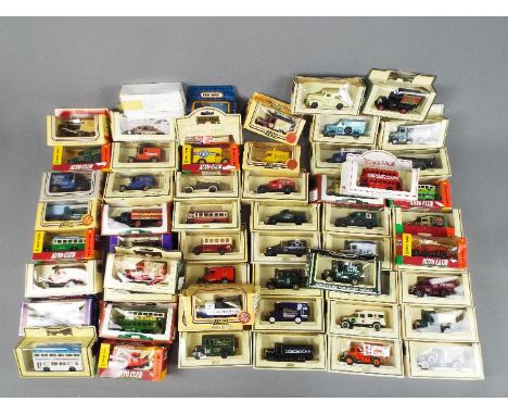 Lledo and Others - 57 boxed diecast model vehicles predominately by Lledo. Lot includes #16009Dennis Parcels Van - Cadburys; 