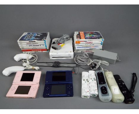 Nintedo - An unboxed Nintendo Wii games console, with accessories, including 5 controllers plus a selection of 14 Nintendo Wi