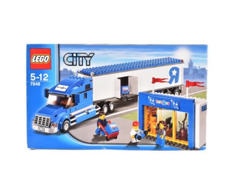 Lego - a factory sealed Lego City set No. 7848 Toys R Us &amp; Storefront. The set containing x3 minifigures. Retired 2011.&n