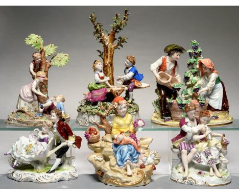 A PLAUE GROUP OF CHILDREN ON A SEESAW, THREE OTHER GERMAN PORCELAIN GROUPS, INCLUDING GRAPE HARVESTERS AND WINE MAKERS AND TW