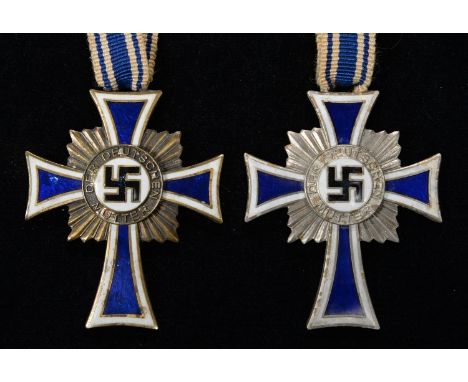 GERMANY, THIRD REICH, MOTHER'S CROSS (2)  One undamaged; the other with tiny chips to blue enamel on one arm